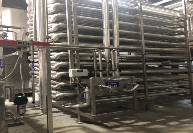Stainless steel processing area with integrated utilities